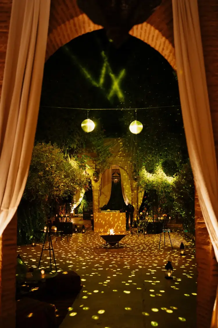 Night wedding celebration with illuminated gardens in Marrakech