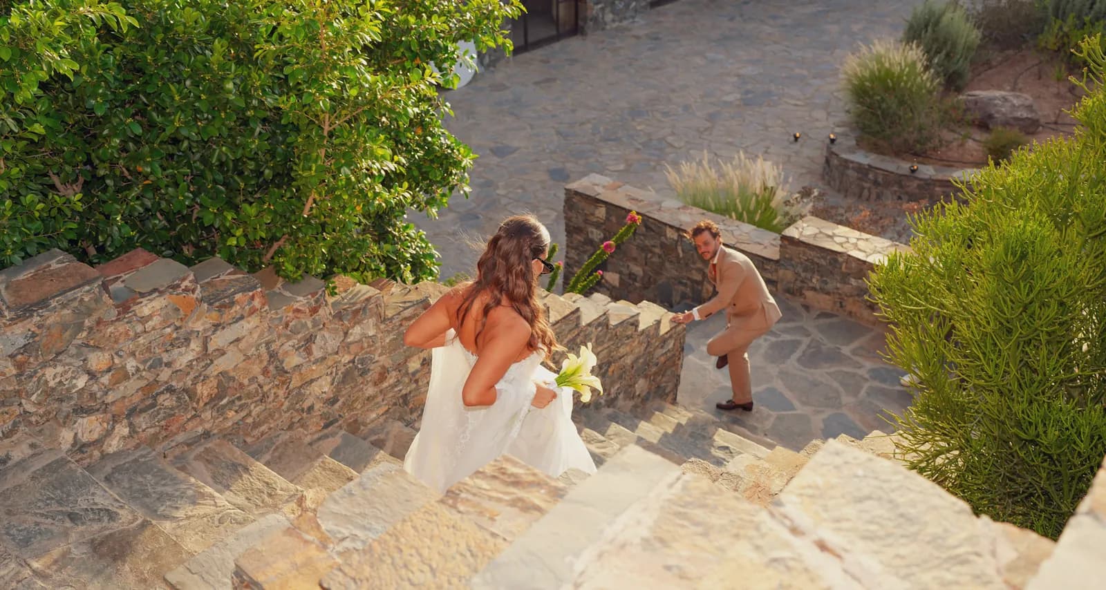 First look on the kasbah steps as the groom turns to see his bride