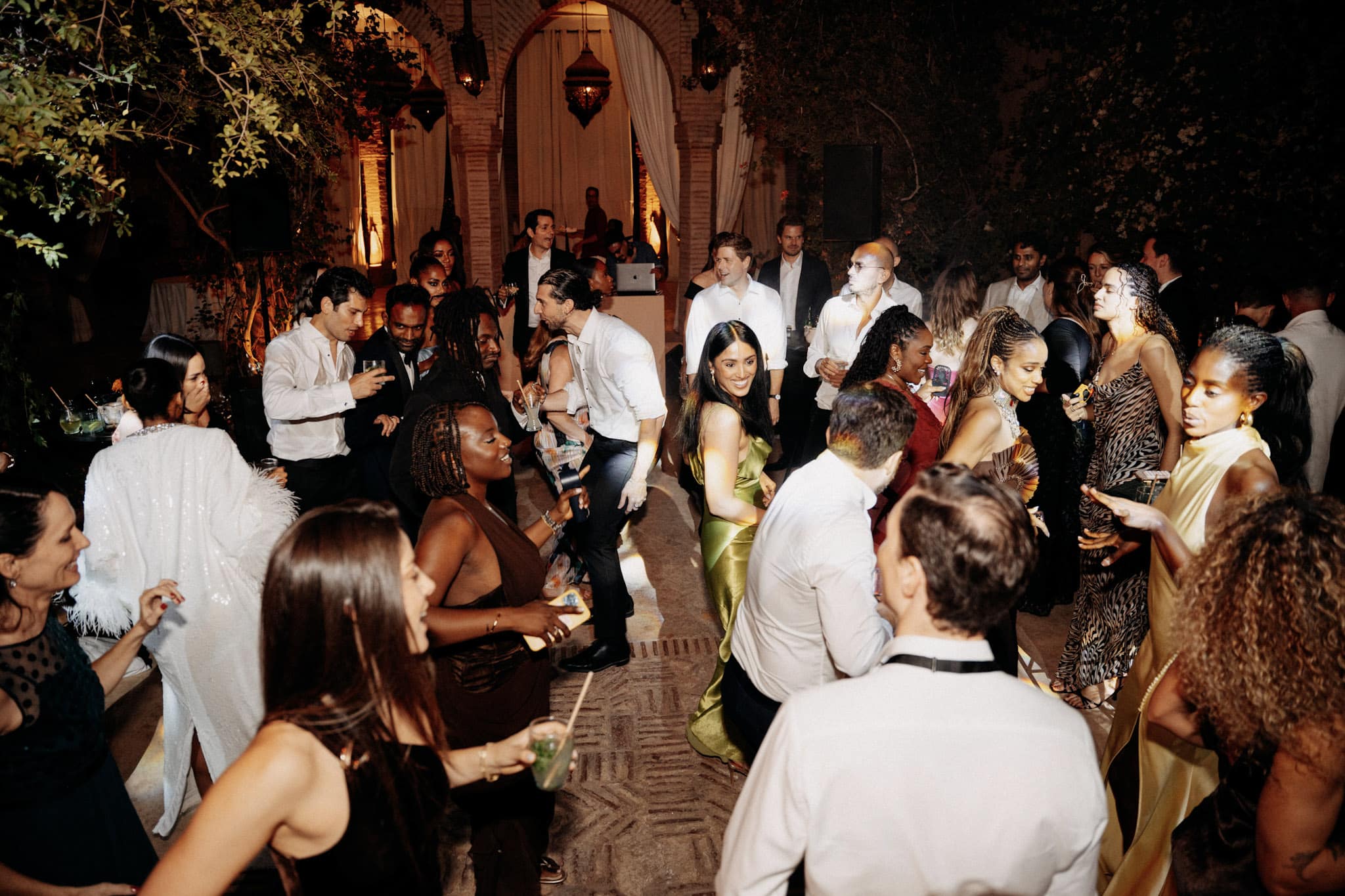 Grand outdoor ceremony at a Marrakech palace garden, winter 2025