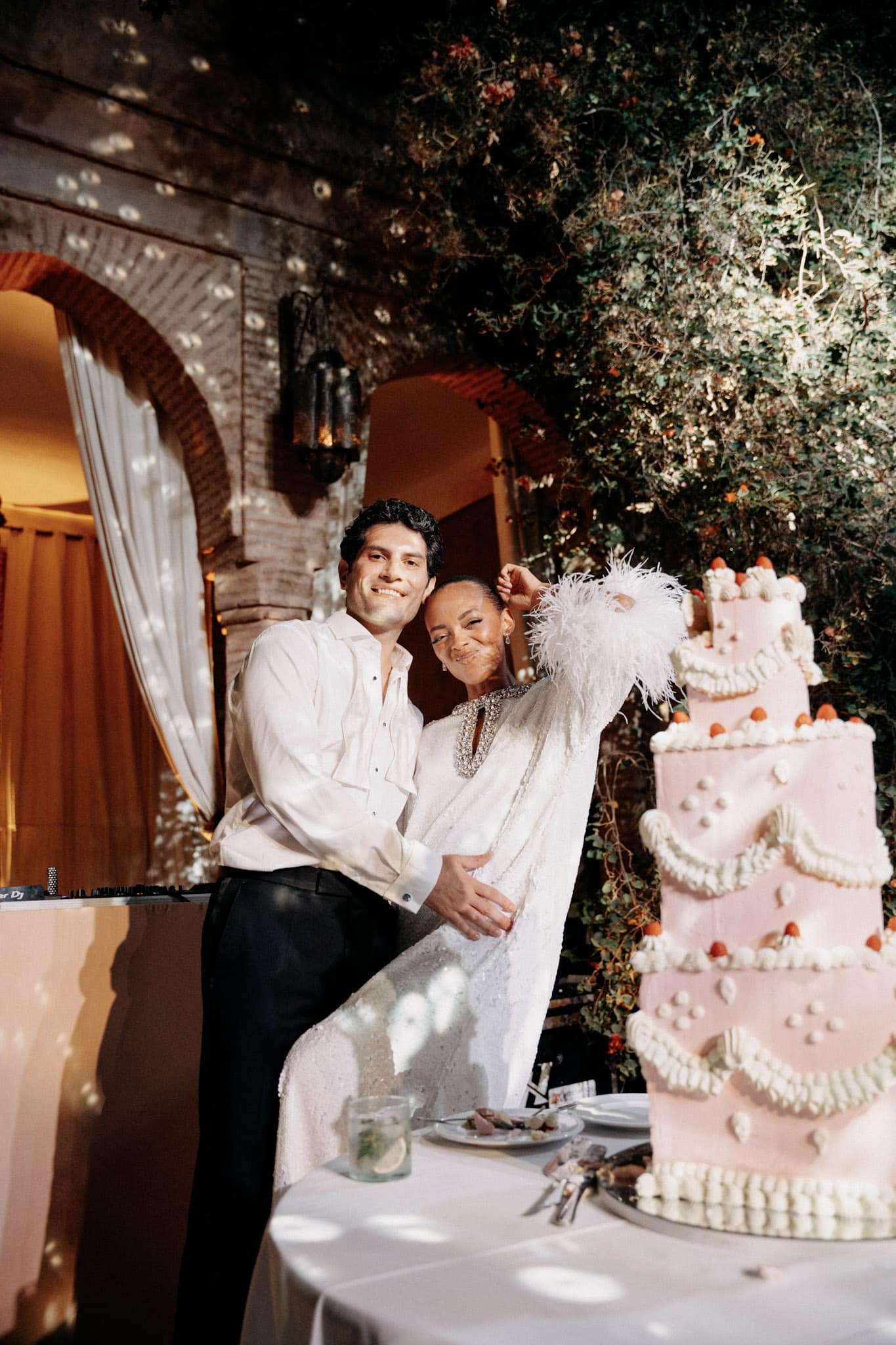 Elegant wedding tablescape with roses and candlelight, Marrakech 2025